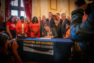 Gov McKee signs bill banning the sale of Assault Weapons in RI